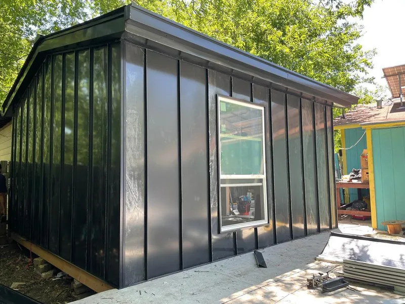 Black standing seam metal wall panels for Metal Roof Installation in Eldorado at Santa Fe