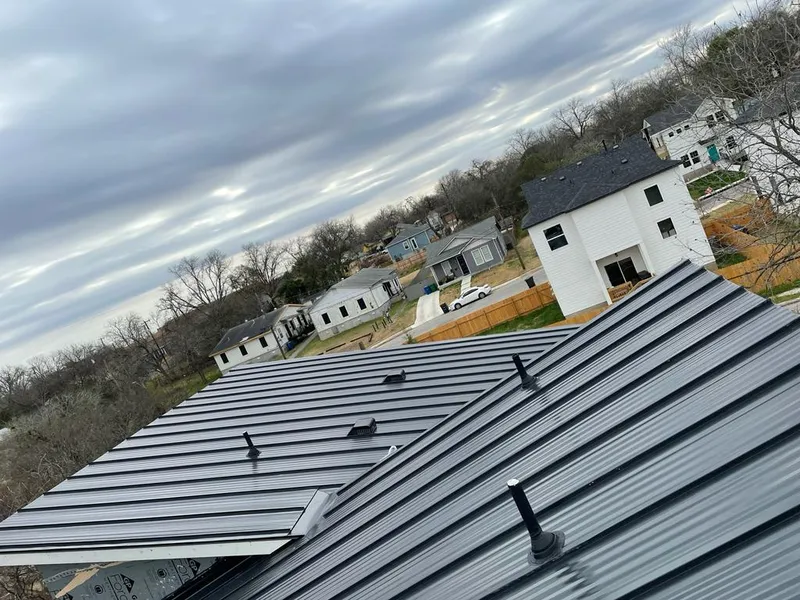 Standing seam metal roof panels with vents for Skylight Repair in Eldorado at Santa Fe